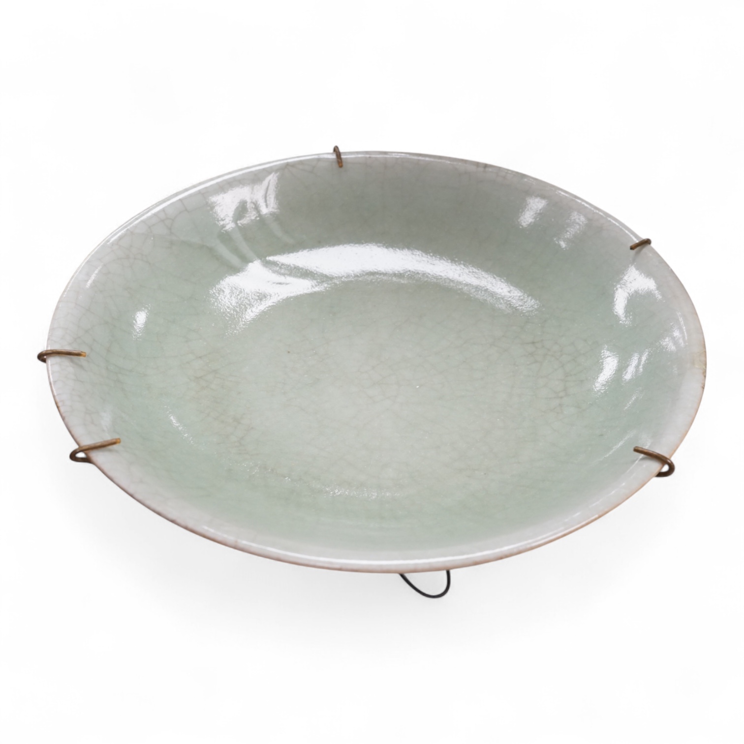 A Chinese celadon glazed dish, late Qing, 34cm in diameter